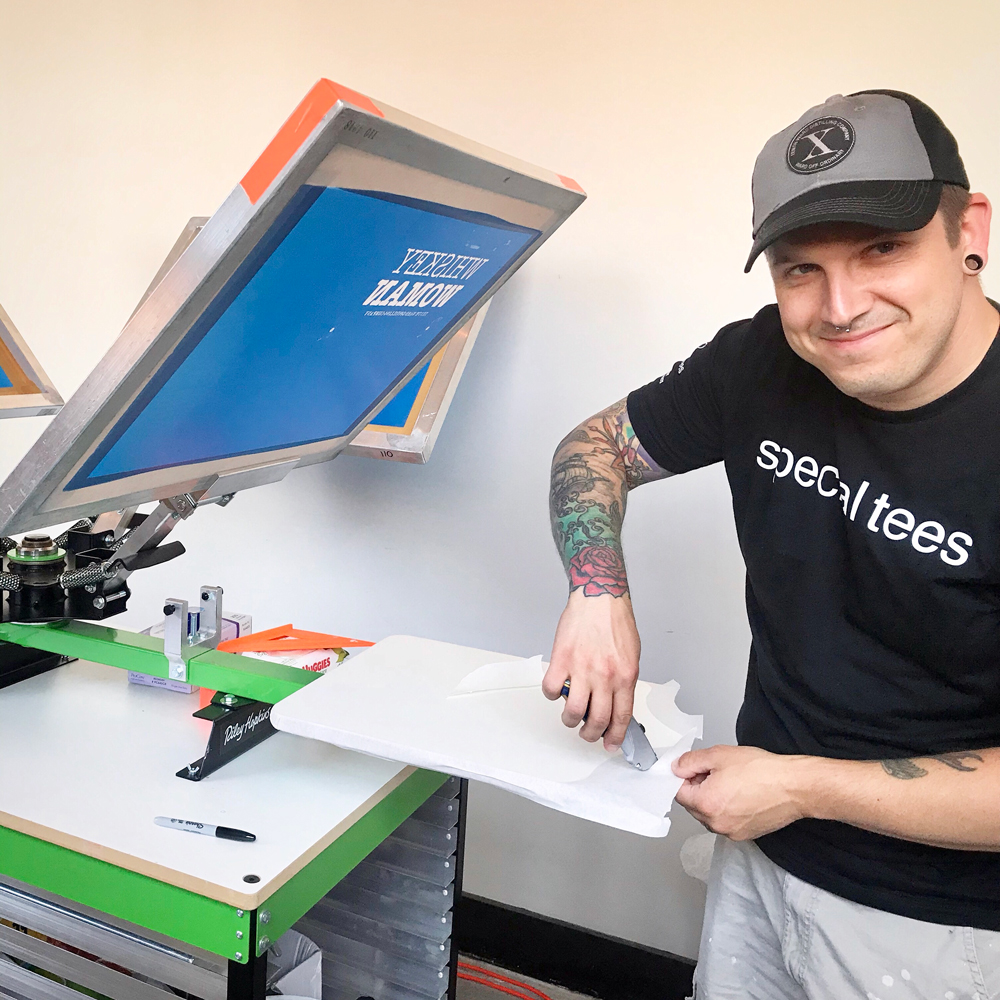 Andy live screen printing at Tenth Ward